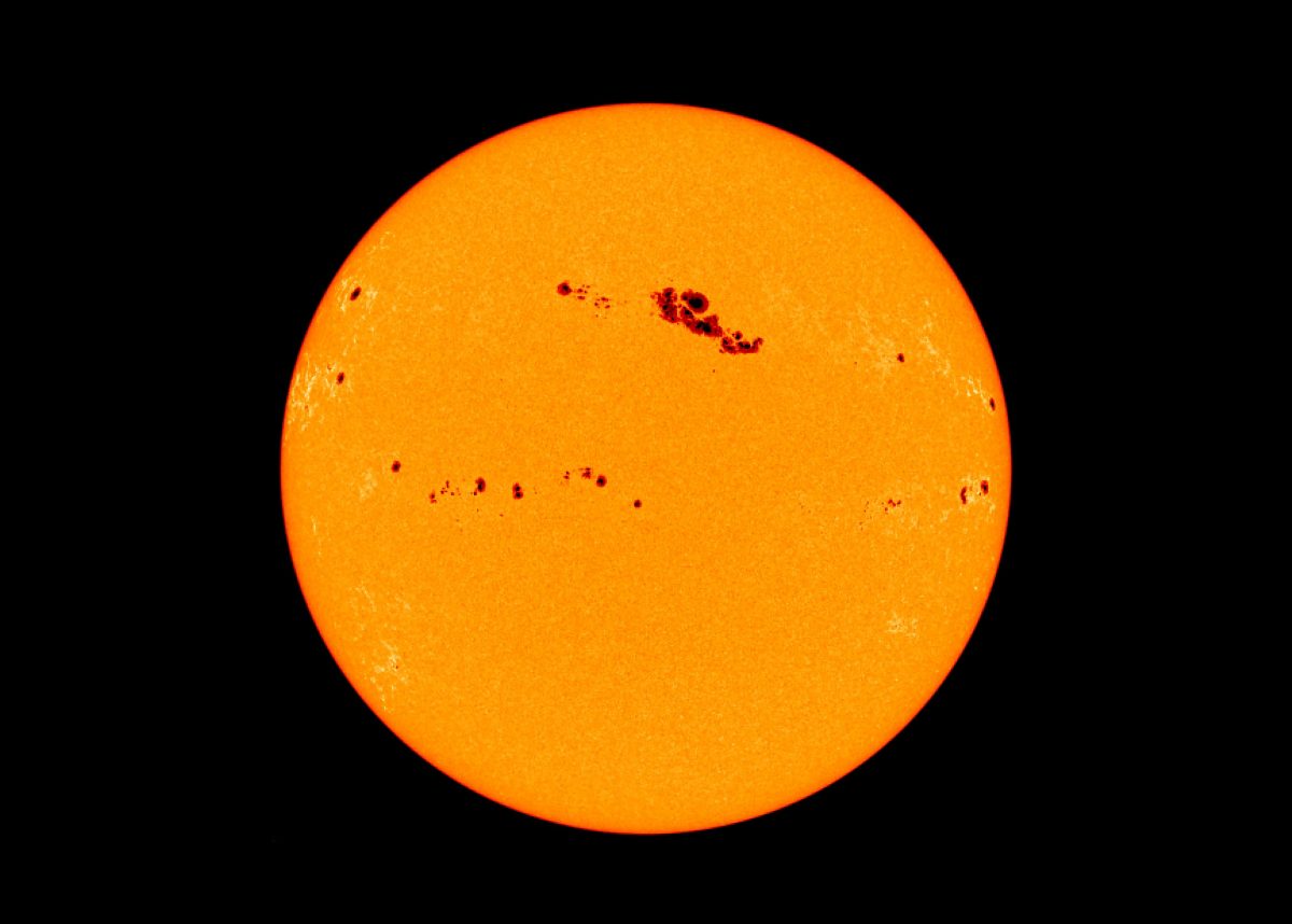 The Sun shows us how sunspots appear dark against a star. Credit: SOHO (ESA & NASA)
