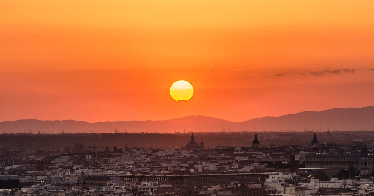 Partial solar eclipse over Madrid, Spain, the country that's arguably the best place to see the August 2026 eclipse. Credit: Cavan Images / Getty Images