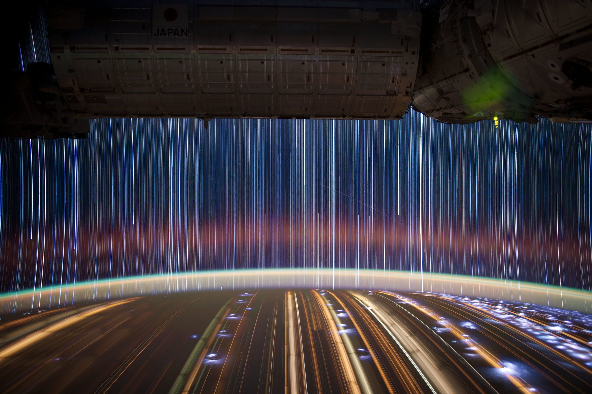 More amazing star trails captured by Don Pettit from the Space Station. Noticeable also are trails from lights on Earth as the Space Station passes over. Credit: NASA