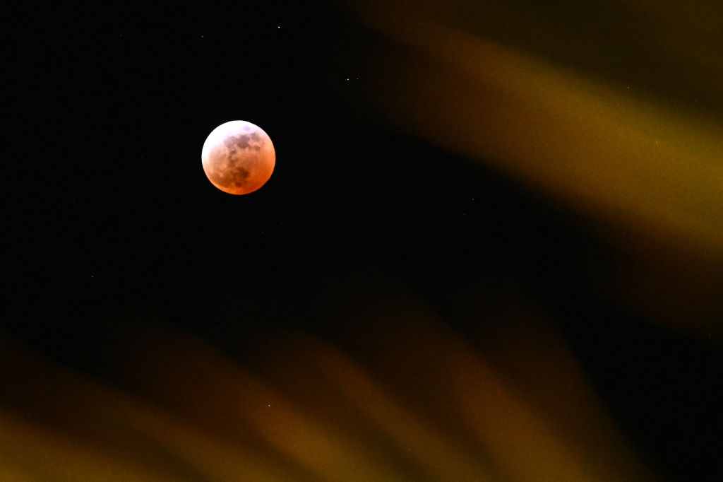 Lunar eclipse over Palm Springs, California, USA, March 13, 2025. Photo by PATRICK T. FALLON/AFP via Getty Images