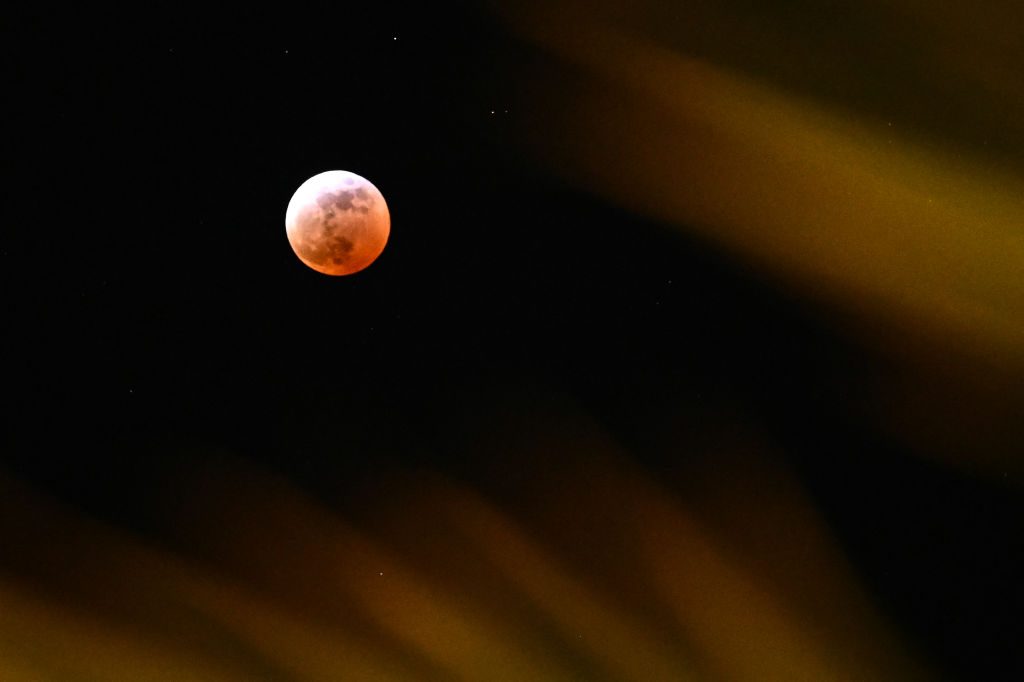 Lunar eclipse over Palm Springs, California, USA, March 13, 2025. Photo by PATRICK T. FALLON/AFP via Getty Images