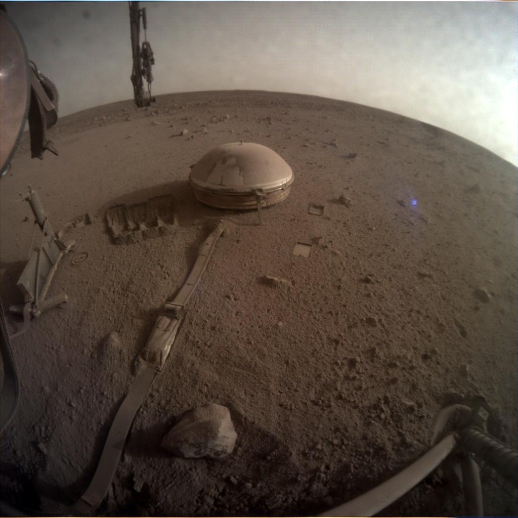 One of the last images taken by NASA’s InSight Mars lander, captured on 11 December 2022, showing the lander's seismometer on the Red Planet's surface. Credit: NASA/JPL-Caltech