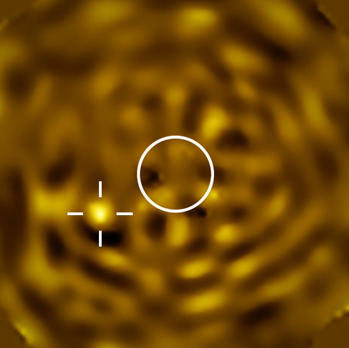 Image captured with the Very Large Telescope showing what's strongly predicted to be Betelgeuse B, the companion star to the red supergiant Betelgeuse. The size of Betelgeuse is circled (with the star removed from the image). The cross pinpoints the suspected Betelgeuse B. Credit: ESO/M. Montargès et al.