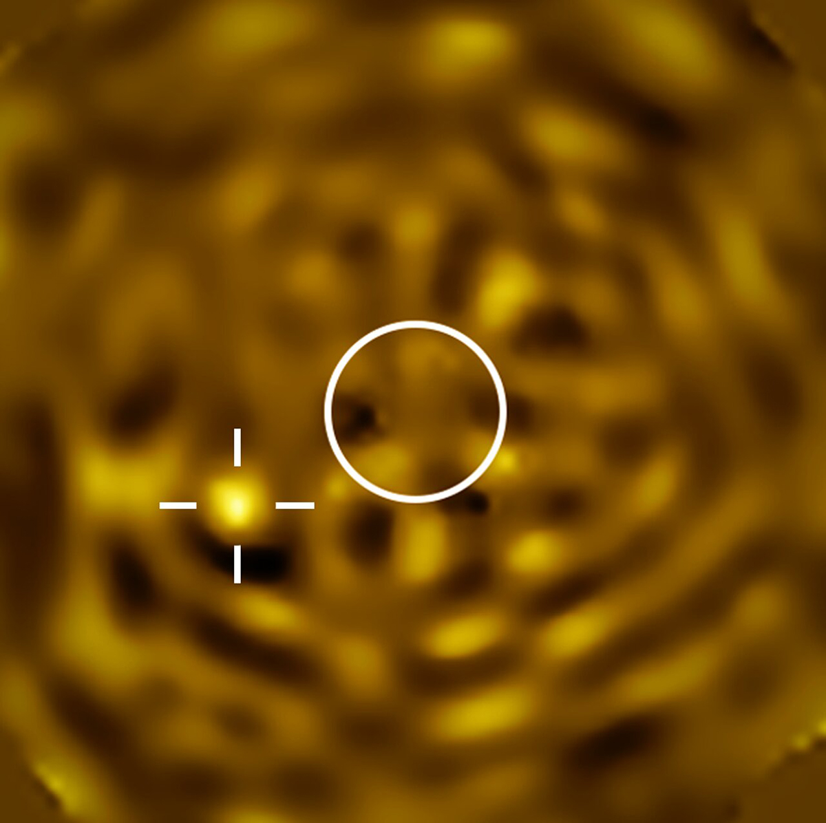Image captured with the Very Large Telescope showing what's strongly predicted to be Betelgeuse B, the companion star to the red supergiant Betelgeuse. The size of Betelgeuse is circled (with the star removed from the image). The cross pinpoints the suspected Betelgeuse B. Credit: ESO/M. Montargès et al.