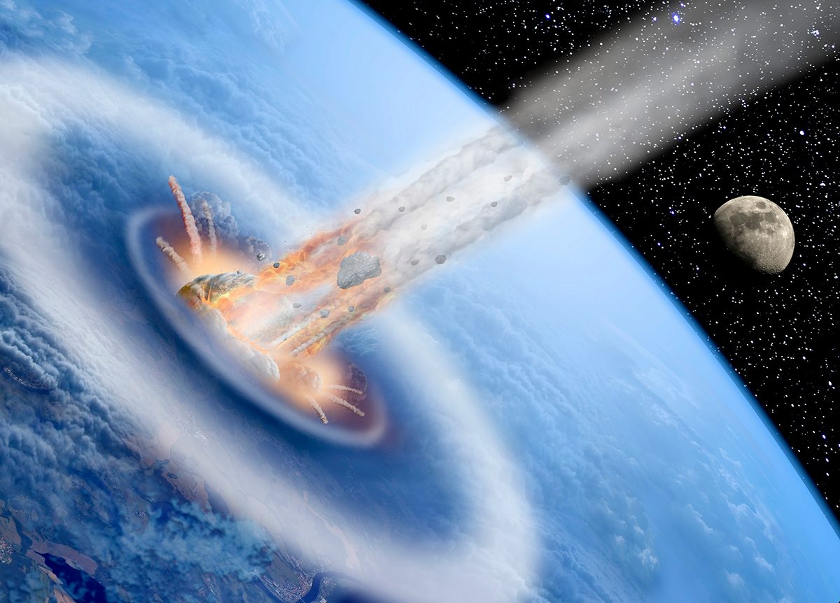 Artist's impression of an asteroid hitting Earth's ocean and causing a tsunami. Credit: Puchan / Getty Images