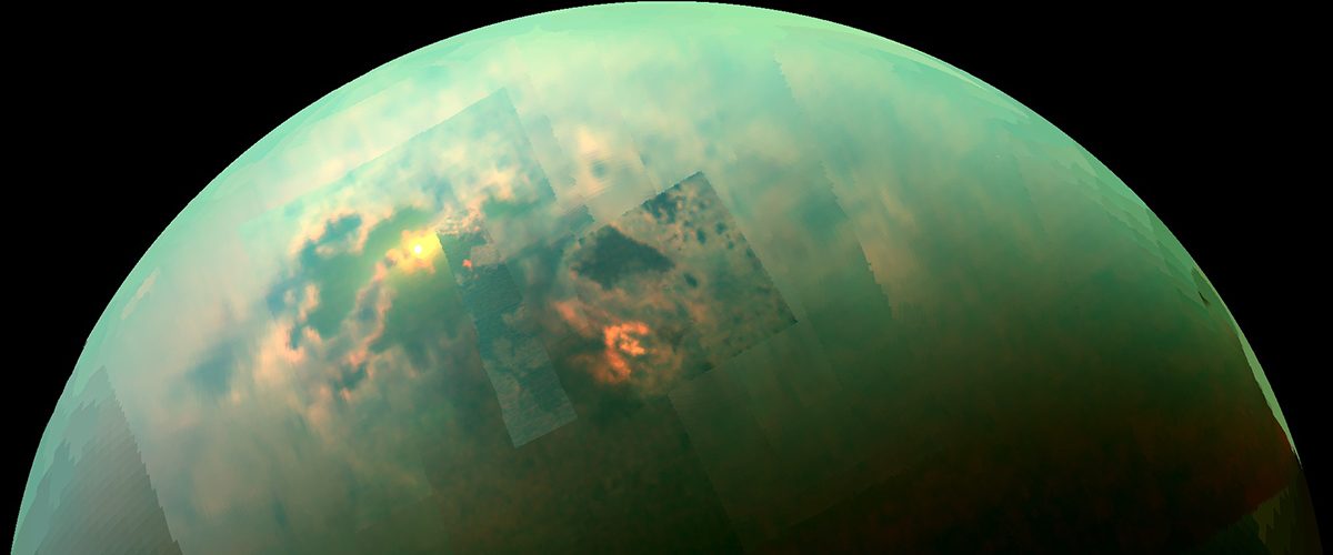 An infrared view of the Saturn moon Titan showing sunlight reflected off its polar lakes. Credits: NASA/JPL-Caltech/Univ. Arizona/Univ. Idaho