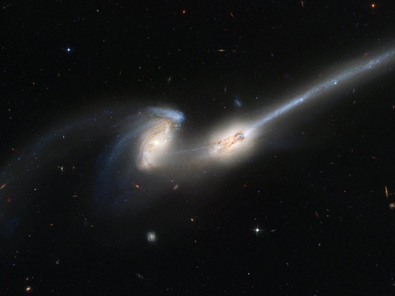 A pair of colliding galaxies nicknamed 'The Mice', captured by the Hubble Space Telescope. Will the Andromeda-Milky Way collision look like this? Credit: NASA, Holland Ford (JHU), the ACS Science Team and ESA