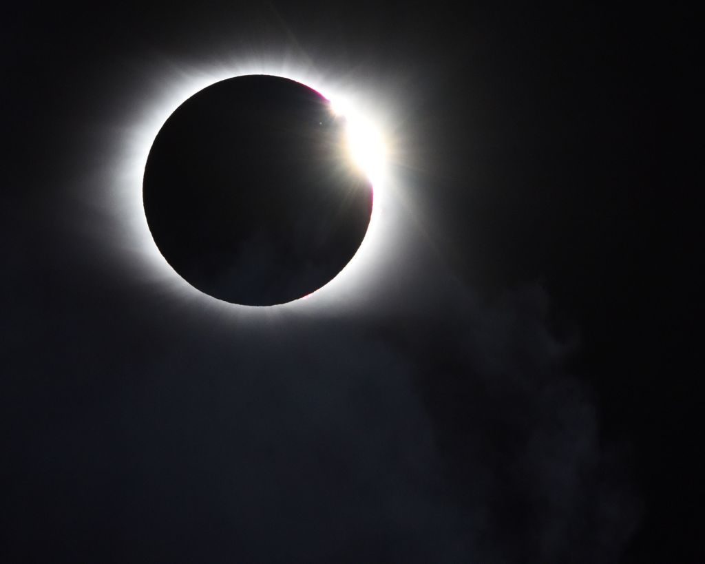 Capturing the diamond ring effect in your solar eclipse photograph may make for a more spectacular image than full totality. Credit: Chris McKay / Getty Images