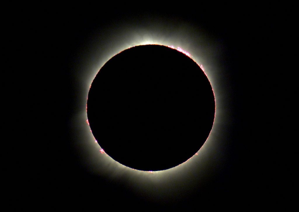 Baily's beads are a great feature to capture in your photograph of a solar eclipse. Photo by TORSTEN BLACKWOOD/AFP via Getty Images