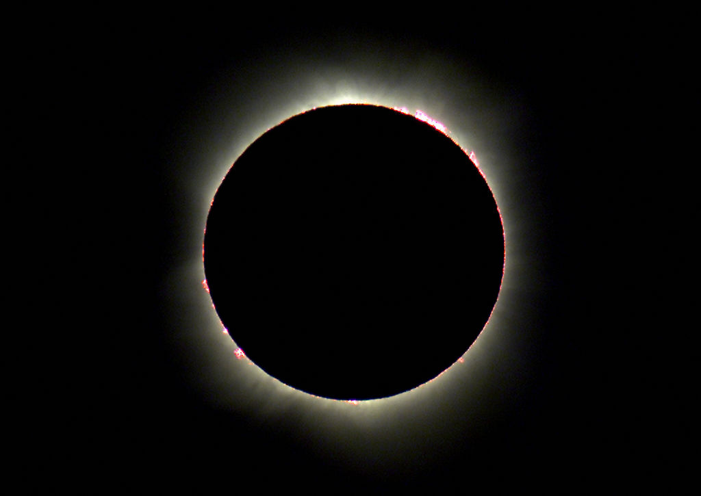 Baily's beads are a great feature to capture in your photograph of a solar eclipse. Photo by TORSTEN BLACKWOOD/AFP via Getty Images