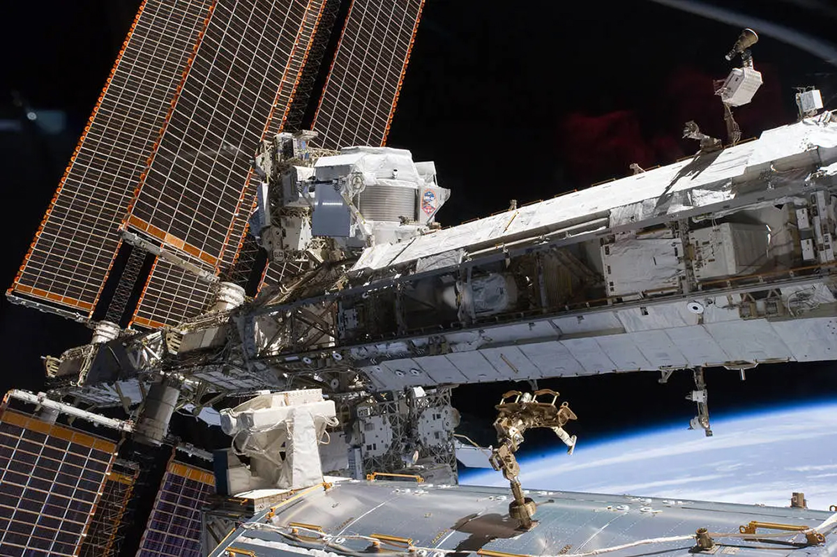 The Alpha Magnetic Spectrometer-2 (AMS) on the International Space Station (visible centre left). Credit: NASA