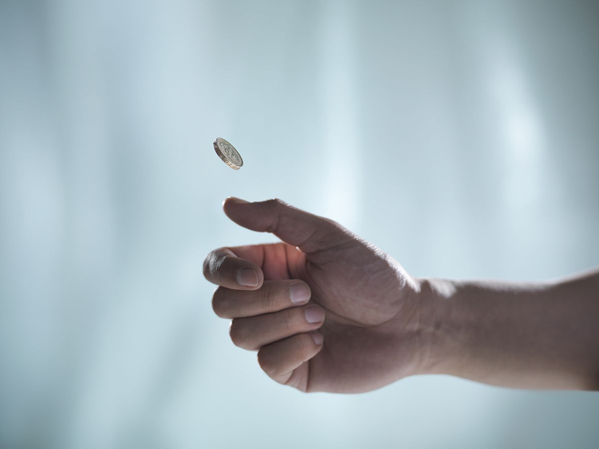 Even despite 20 heads in a row, you can't predict what the next coin toss will be. Credit: Monty Rakusen / Getty Images