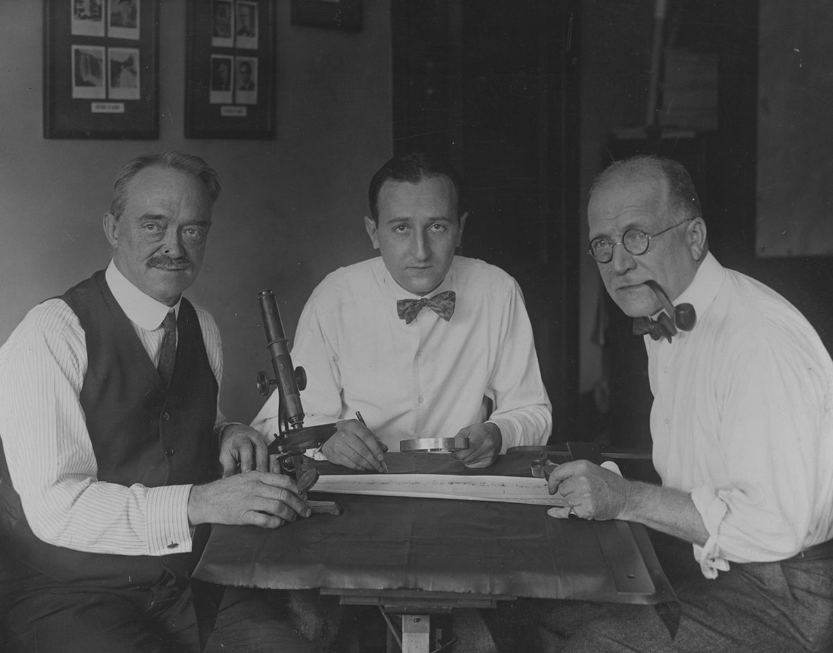 David Peck Todd (right, pictured with inventor Charles Francis Jenkins (left) and army cryptographer William F. Friedman (middle) during the study of a piece of film which appeared to have captured radio signals from space, 1924. Photo by Henry Miller News Picture Service/FPG/Getty Images