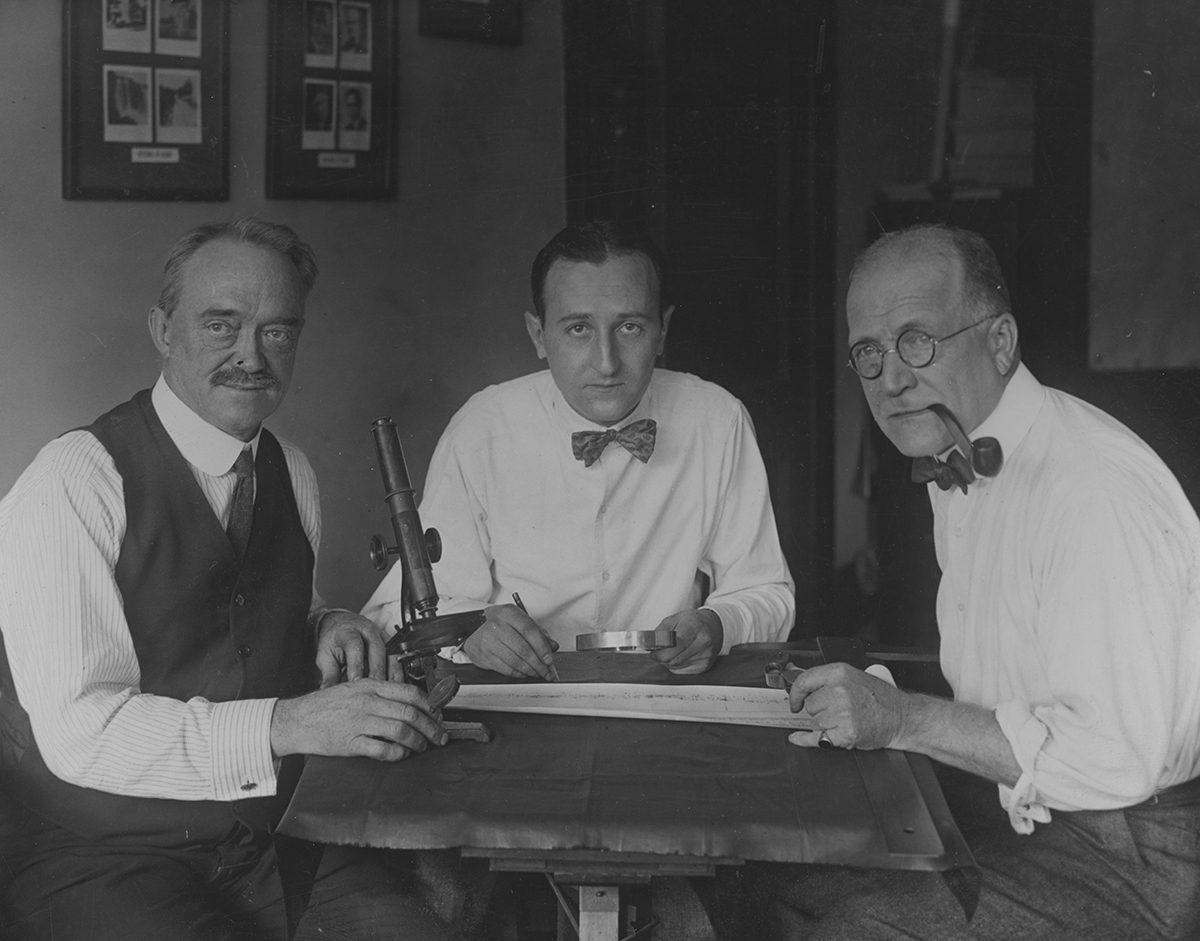 David Peck Todd (right, pictured with inventor Charles Francis Jenkins (left) and army cryptographer William F. Friedman (middle) during the study of a piece of film which appeared to have captured radio signals from space, 1924. Photo by Henry Miller News Picture Service/FPG/Getty Images
