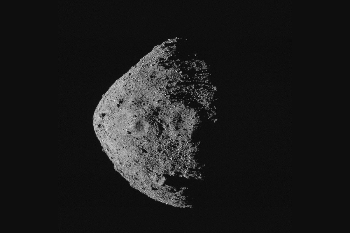 A view of asteroid Bennu, its striking craters and surface covered in boulders, captured by OSIRIS-REx's OCAMS (MapCam) instrument on 28 April 2020 from a distance of 10km. Half of Bennu is bathed in sunlight, and half is in shadow. Credit: NASA/Goddard/University of Arizona