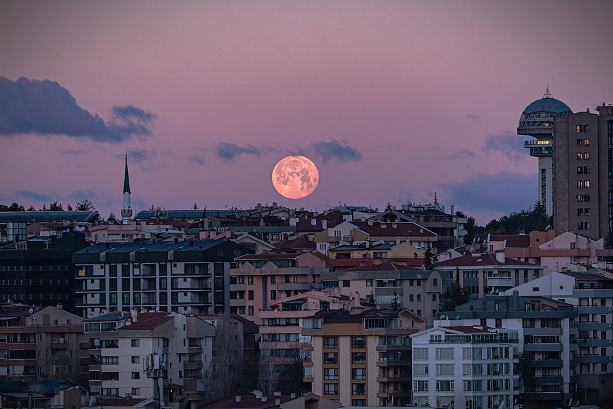 Ever seen a morning full Moon? The Hunter's Moon could be your chance. Photo by Yasin Baturhan Ergin/Anadolu via Getty Images