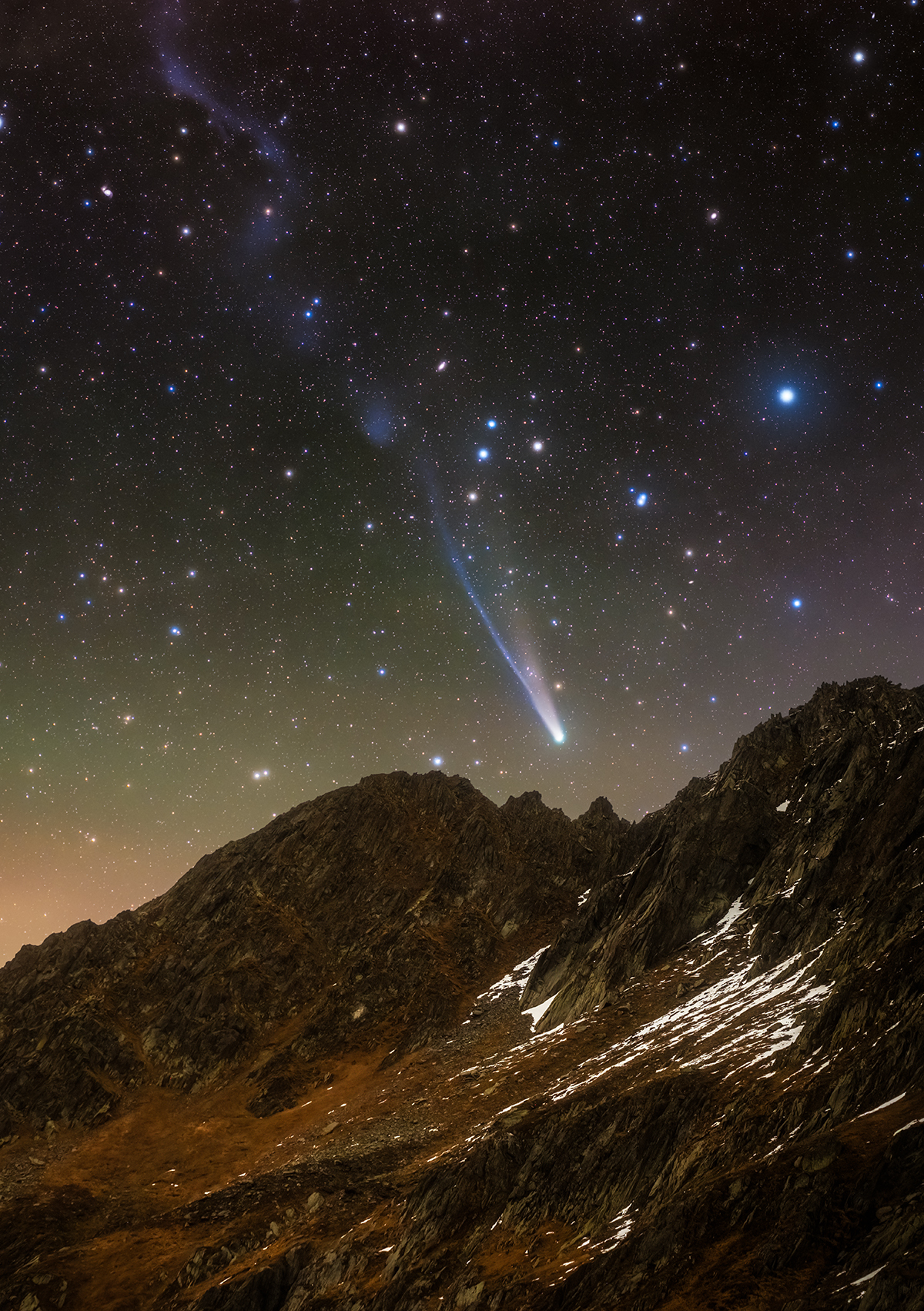 Comet C/2025 A6 (Lemmon) Over the Swiss Alps © Jakob Sahner (Germany), Planets, Comets and Asteroids category. Taken with a Nikon Z 7 camera, Move Shoot Move Nomad star tracker, TTArtisans AF 85 mm f/1.8 lens, 85 mm f/2.2, ISO 800, Foreground: 120-second exposure; Sky: 38 x 30-second exposures. Location: Tujetsch, Graubünden, Switzerland, 18 October 2025