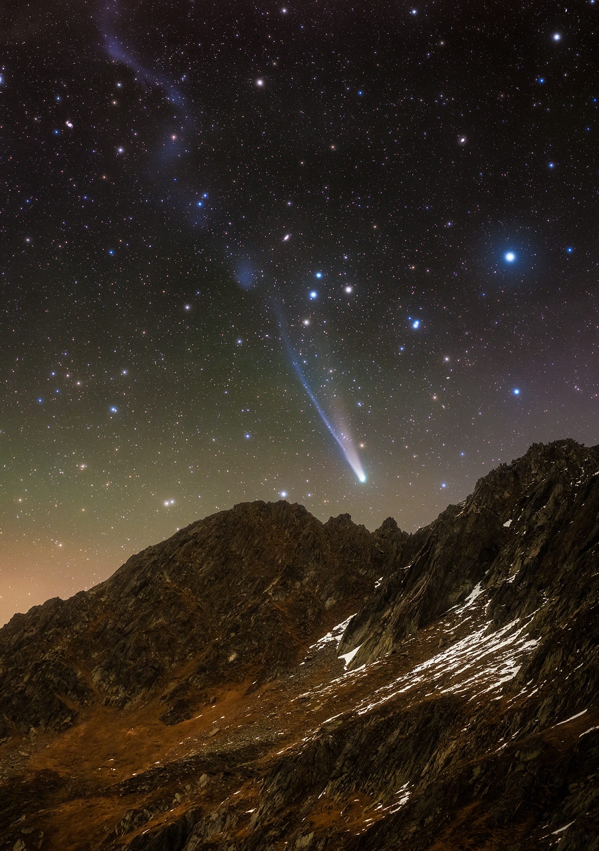 Comet C/2025 A6 (Lemmon) Over the Swiss Alps © Jakob Sahner (Germany), Planets, Comets and Asteroids category. Taken with a Nikon Z 7 camera, Move Shoot Move Nomad star tracker, TTArtisans AF 85 mm f/1.8 lens, 85 mm f/2.2, ISO 800, Foreground: 120-second exposure; Sky: 38 x 30-second exposures. Location: Tujetsch, Graubünden, Switzerland, 18 October 2025