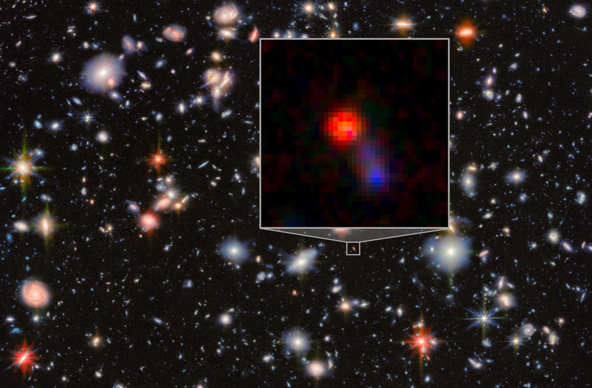 The Virgil Galaxy, as seen by the James Webb Space Telescope (inset), against the Hubble Space Telescope's eXtreme Deep Field. Credit: ESA/Webb, NASA & CSA, G. Östlin, P. G. Perez-Gonzalez, J. Melinder, the JADES Collaboration, M. Zamani (ESA/Webb)