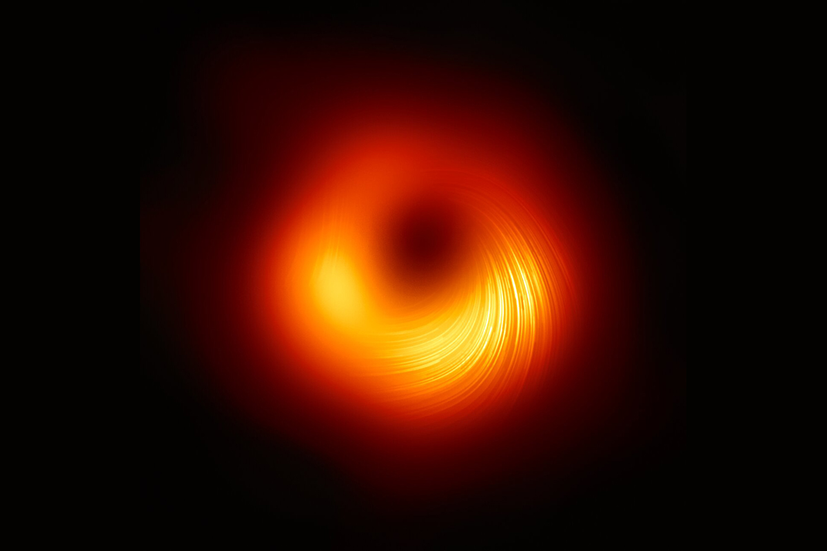The black hole at the centre of galaxy M87 as it appears in polarised light. Credit: EHT Collaboration