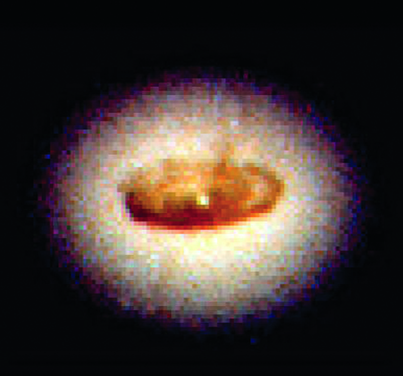 4 December 2005 This doughnut shape is an 800 lightyear-wide disc of dust fuelling a black hole at the centre of galaxy NGC 4261. The doughnut is calculated to be 1.2 billion times the mass of the Sun while the black hole’s gravity is capable of pulling in enough surrounding material to make 100,000 stars like our Sun.