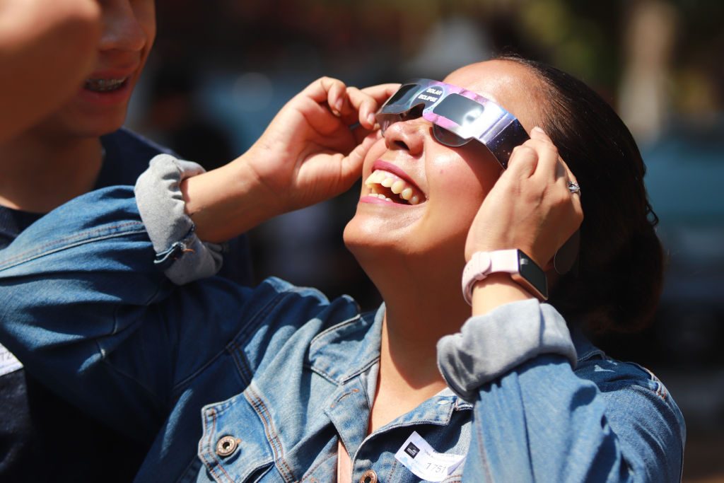 eclipse glasses. Photo by Solrac Santiago/NurPhoto via Getty Images
