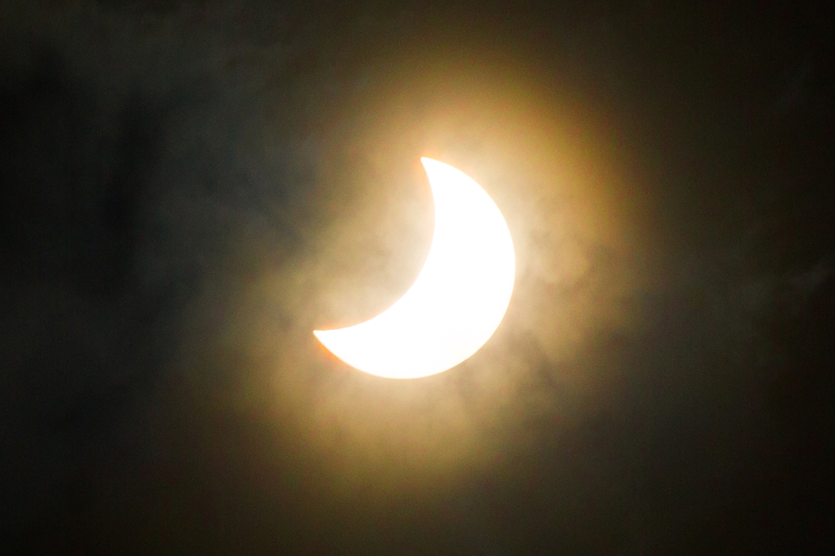 During a solar eclipse, the Moon takes a 'bite' out of the Sun. Credit: Artur Debat / Getty Images