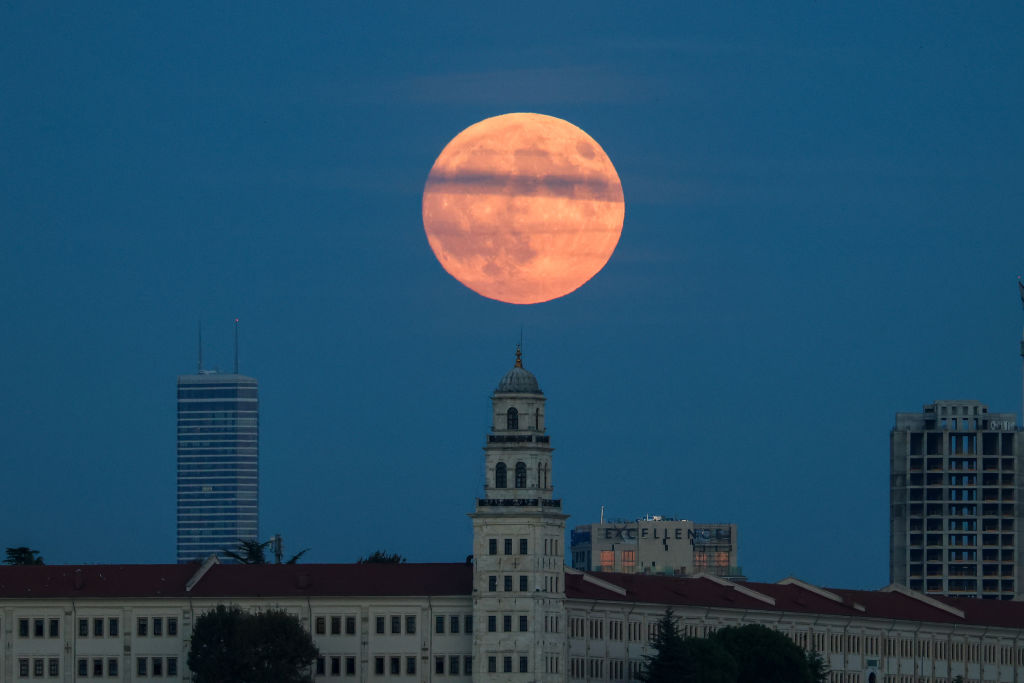 the Super Harvest Moon over Istanbul, Türkiye. Photo by Sercan Ozkurnazli/ dia images via Getty Images