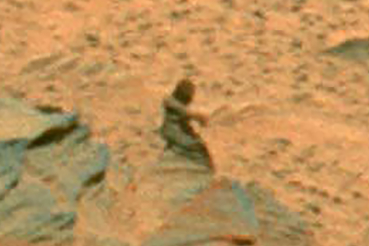 Martian rover Spirit captured this image in 2007. The dark ‘female figure’ is, in reality, just an oddly shaped rock. NASA/JPL-Caltech/Cornell University