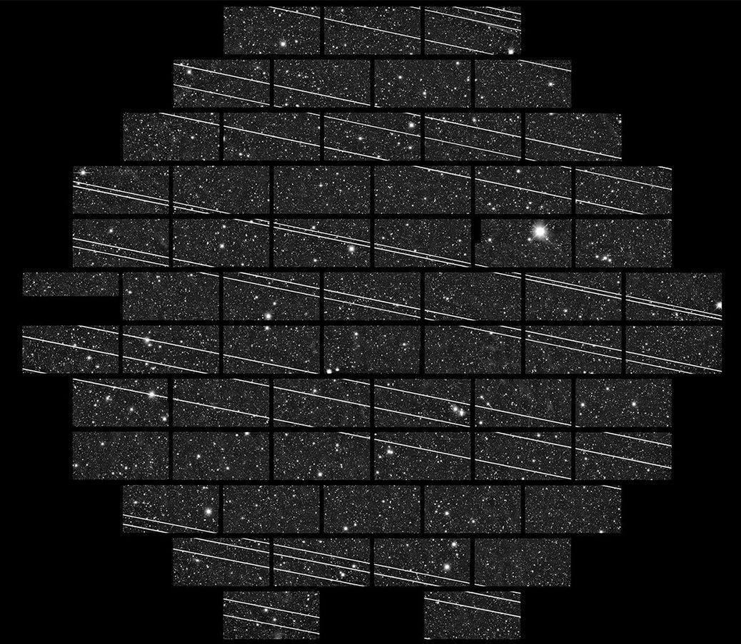 A 333-second exposure captured using the Blanco 4m telescope at the Cerro Tololo Inter-American Observatory (CTIO) shows 19 streaks that astronomers attributed to Starlink satellites. Credit: NSF’s National Optical-Infrared Astronomy Research Laboratory/CTIO/AURA/DELVE