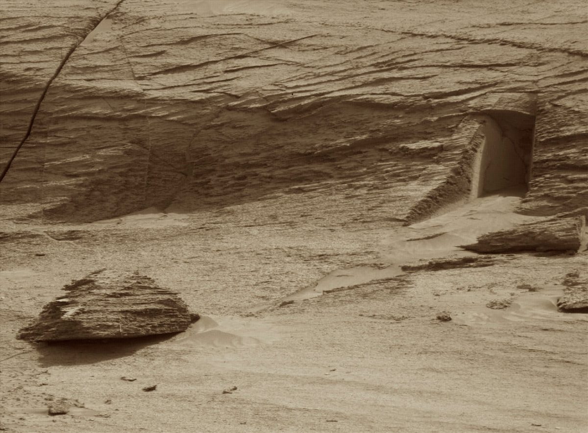Despite appearances, this isn’t a doorway on Mars – just a natural fissure in the Martian rock. It’s also less than a foot high! Credit: NASA/JPL-Caltech/MSSS/NeV-T