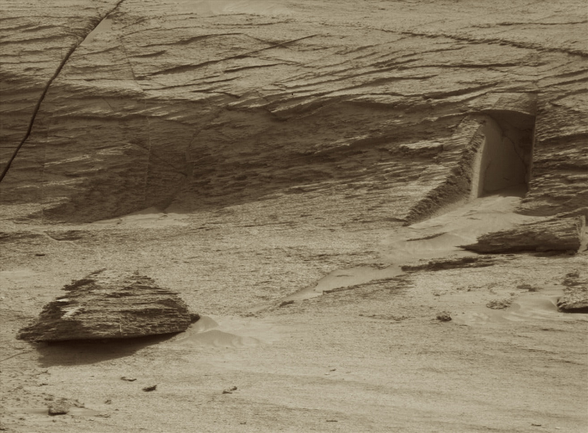 Despite appearances, this isn’t a doorway on Mars – just a natural fissure in the Martian rock. It’s also less than a foot high! Credit: NASA/JPL-Caltech/MSSS/NeV-T