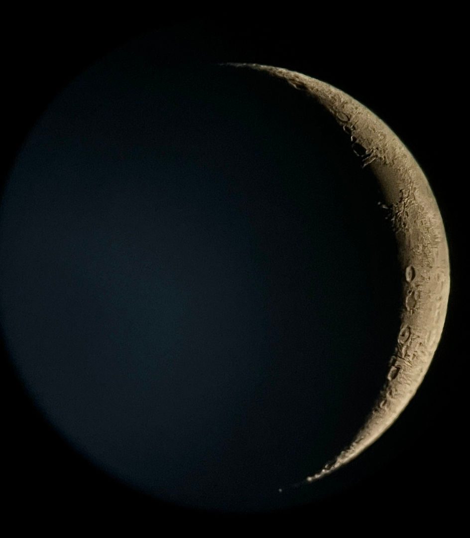 Waxing crescent Moon Ammaarah Mirza, Nottingham, UK, 17 June 2026 Equipment: iPhone 13 smartphone, Celestron ExploraScope 114AZ reflector, supplied mount
