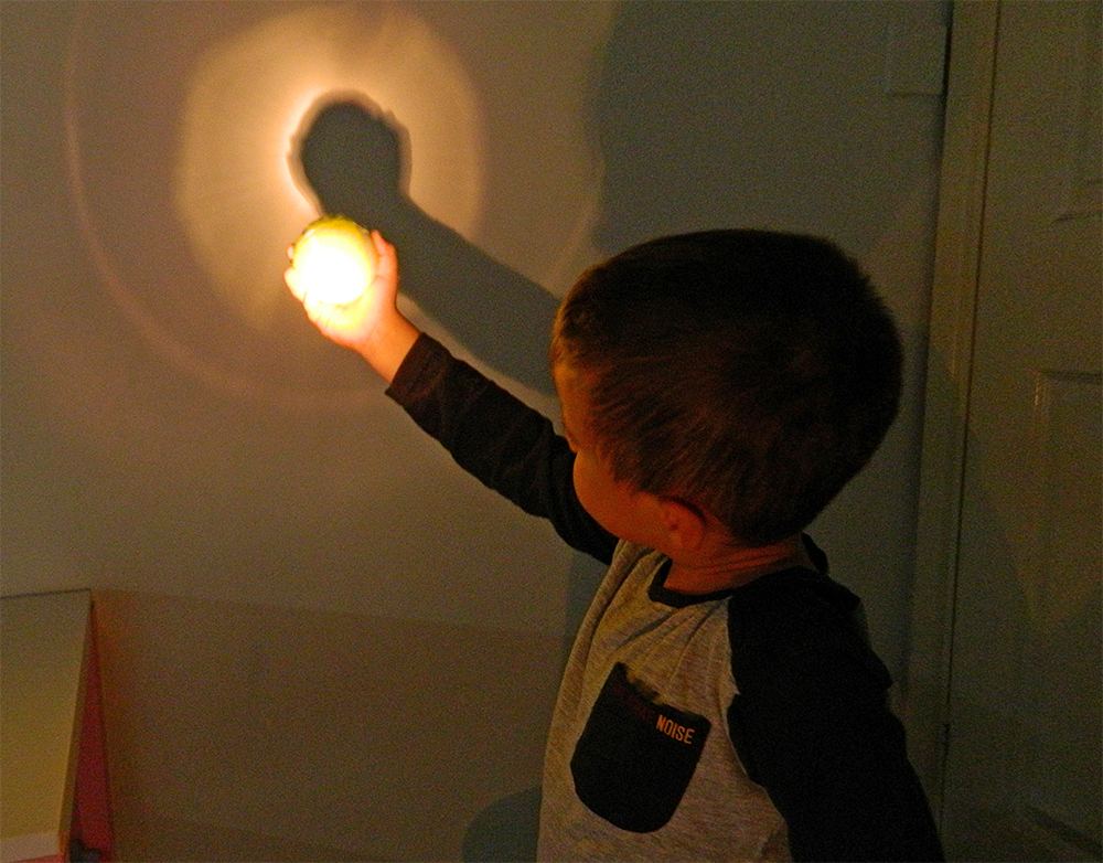 Teach kids about an eclipse with a tennis ball and torch. Credit: Steve Marsh Space activities can be as simple as teaching kids about an eclipse with a tennis ball and torch. Credit: Steve Marsh