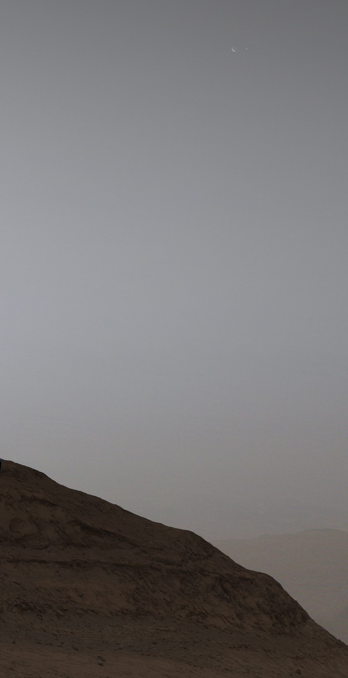 Full image of Mars moon Phobos (left) and Earth (right captured from the surface of Mars by NASA's Curiosity rover. Credit: NASA/JPL-Caltech/MSSS