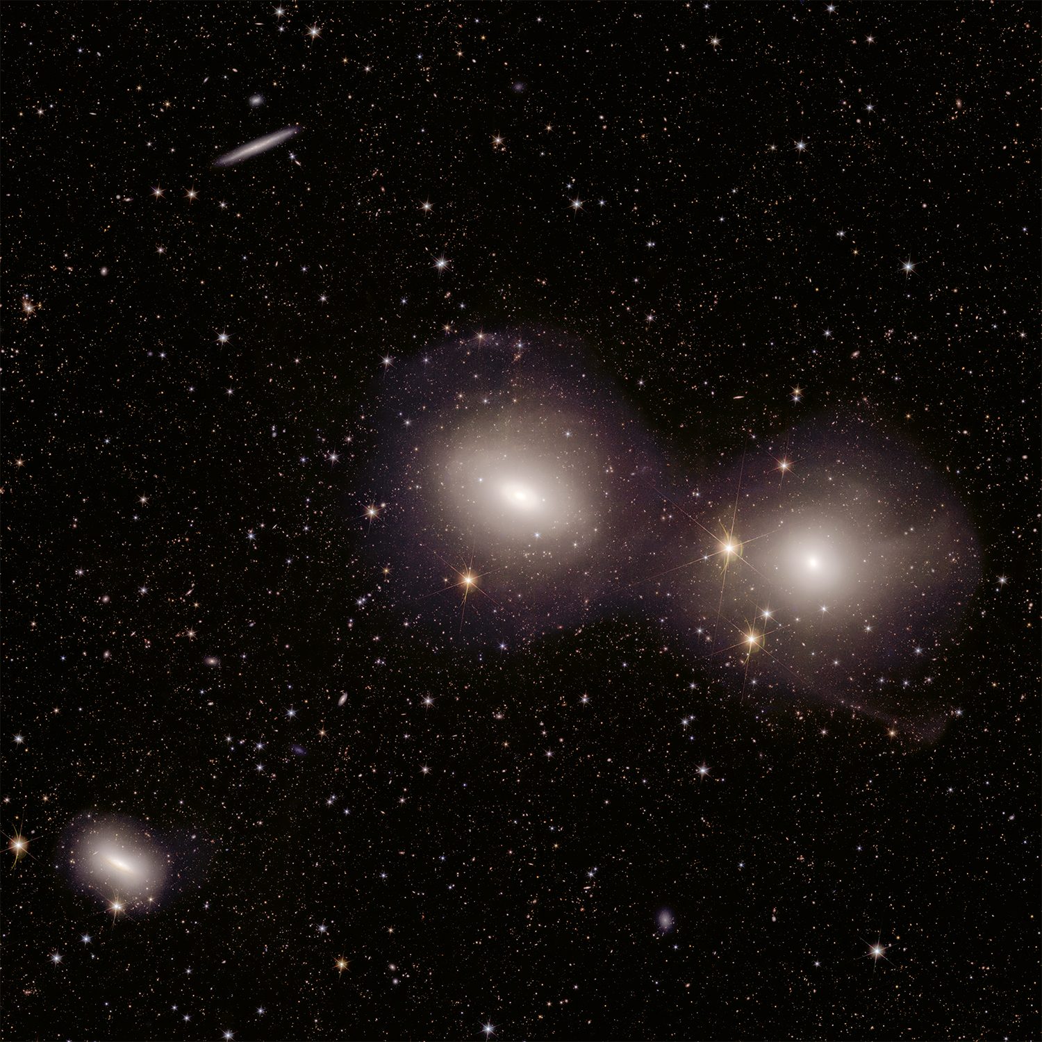 Euclid spacecraft image of the Dorado Group of galaxies, 62 million lightyears away in the southern hemisphere constellation Dorado. Credit: ESA/Euclid/Euclid Consortium/NASA, image processing by J.-C. Cuillandre (CEA Paris-Saclay), G. Anselmi; CC BY-SA 3.0 IGO or ESA Standard Licence.
