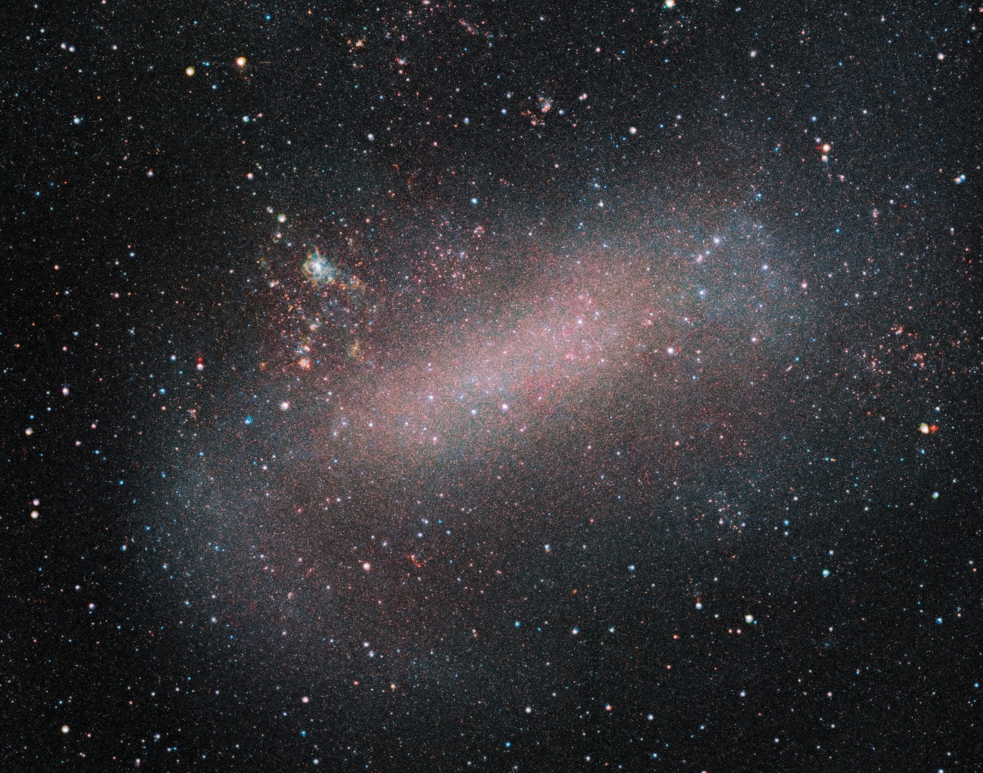 An image of the Large Magellanic Cloud captured by the VISTA telescope. Credit: ESO/VMC Survey