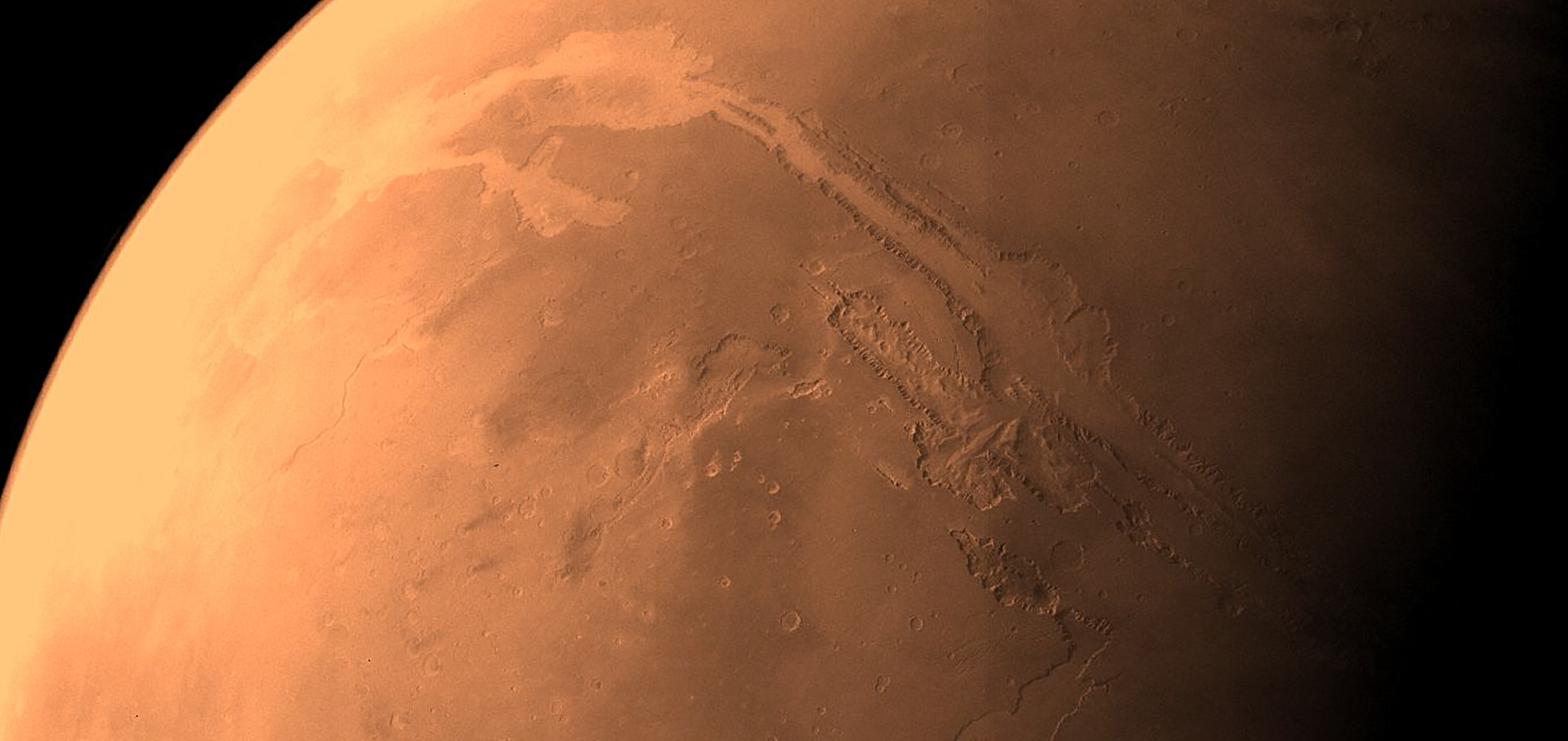 Valles Marineris is a 4,000km-long canyon that reaches depths of 7km – about five times deeper than the Grand Canyon on Earth. It is a tectonic crack, created four billion years ago as the planet cooled.