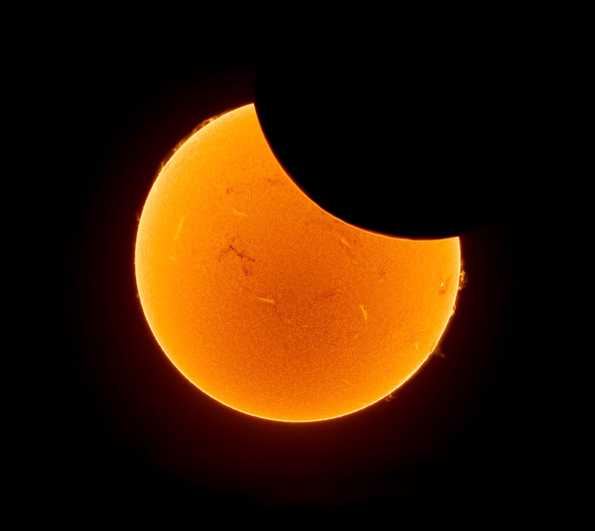 Partial solar eclipse, 29 March 2025. Ivana Peranic, Brighton, UK. Equipment: 40mm Lunt, ZWO ASI174mm. Software: SharpCap, Autostakkert, IMPPG, GIMP