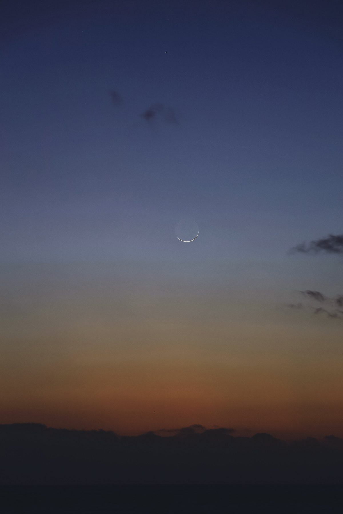 Mercury, the Moon and Venus at sunset, captured by Giovanni Passalacqua, Sicily, Italy, 18 February 2026, 18:27 local time. Equipment: Canon EOS R DSLR camera, Sigma 200mm lens, Manfrotto tripod. Exposure: ISO 100, f/5.6, 1.3s. Software: Photoshop
