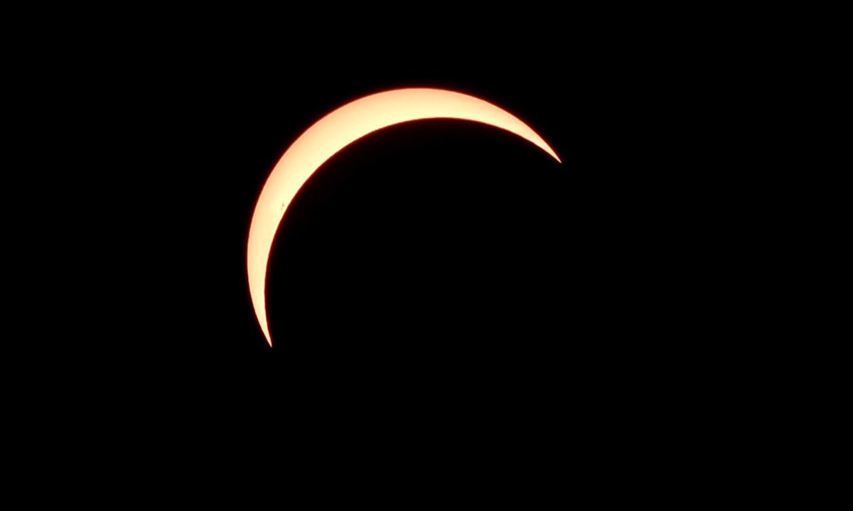 Partial solar eclipse by James Crossley, Blackstone Edge Reservoir, Rochdale, UK, 12 August 2026