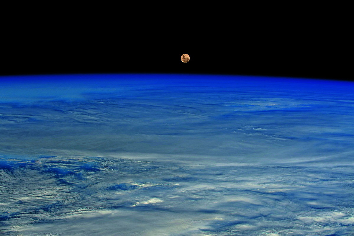 What the Moon looks like from space. The Moon over Earth, as seen from space, captured by ESA astronaut Thomas Pesquet, featured in his book The Earth in Our Hands. Credit: Firefly Books