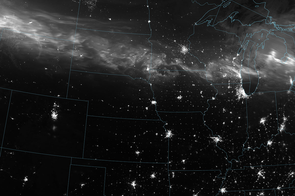A view of the 10/11 May 2024 aurora display over the USA from space. Credit: NASA Earth Observatory image by Wanmei Liang, VIIRS data from Suomi National Polar-orbiting Partnership. Photo by Gunjan Sinha.