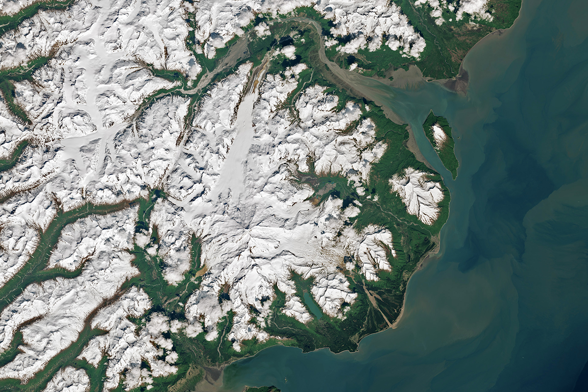 Iliamna Volcano as seen from space. NASA Earth Observatory image by Wanmei Liang, using Landsat data from the U.S. Geological Survey.