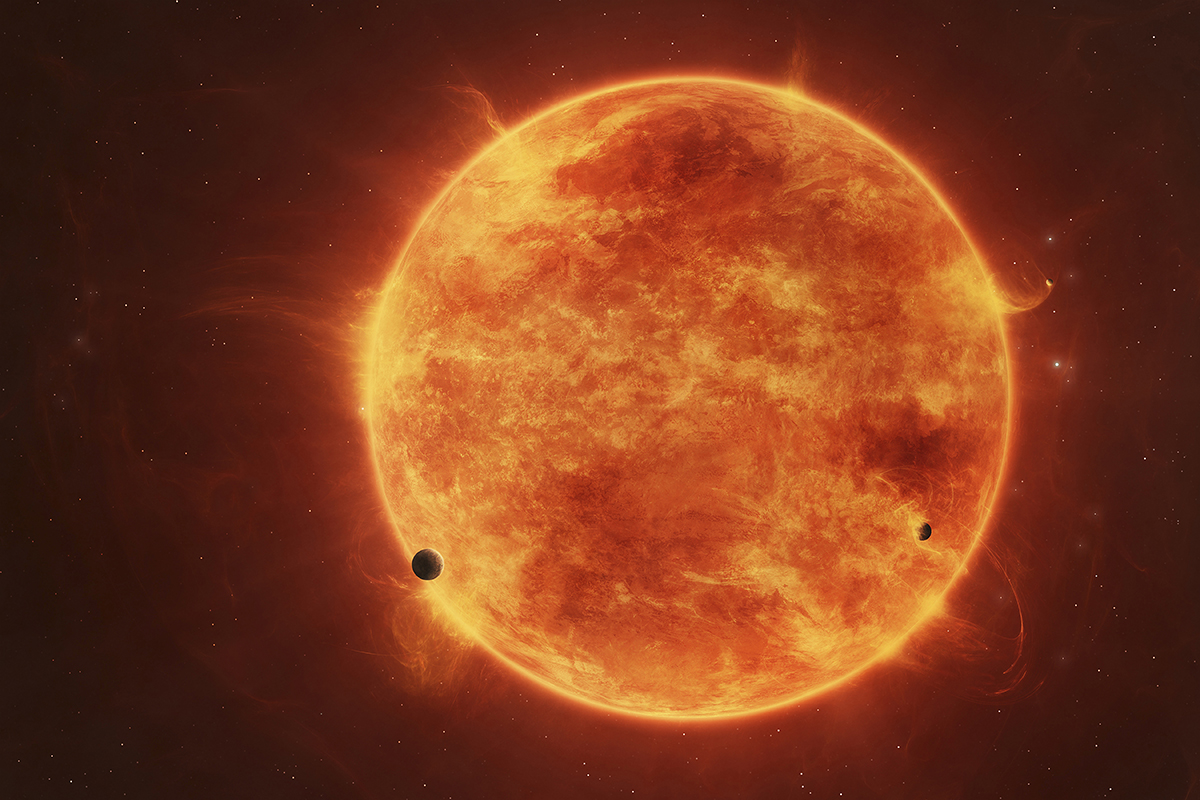 A star like our Sun swelling into a red giant and engulfing its orbiting planets. Credit: Stocktrek Images/Tomasz Dabrowski / Getty Images
