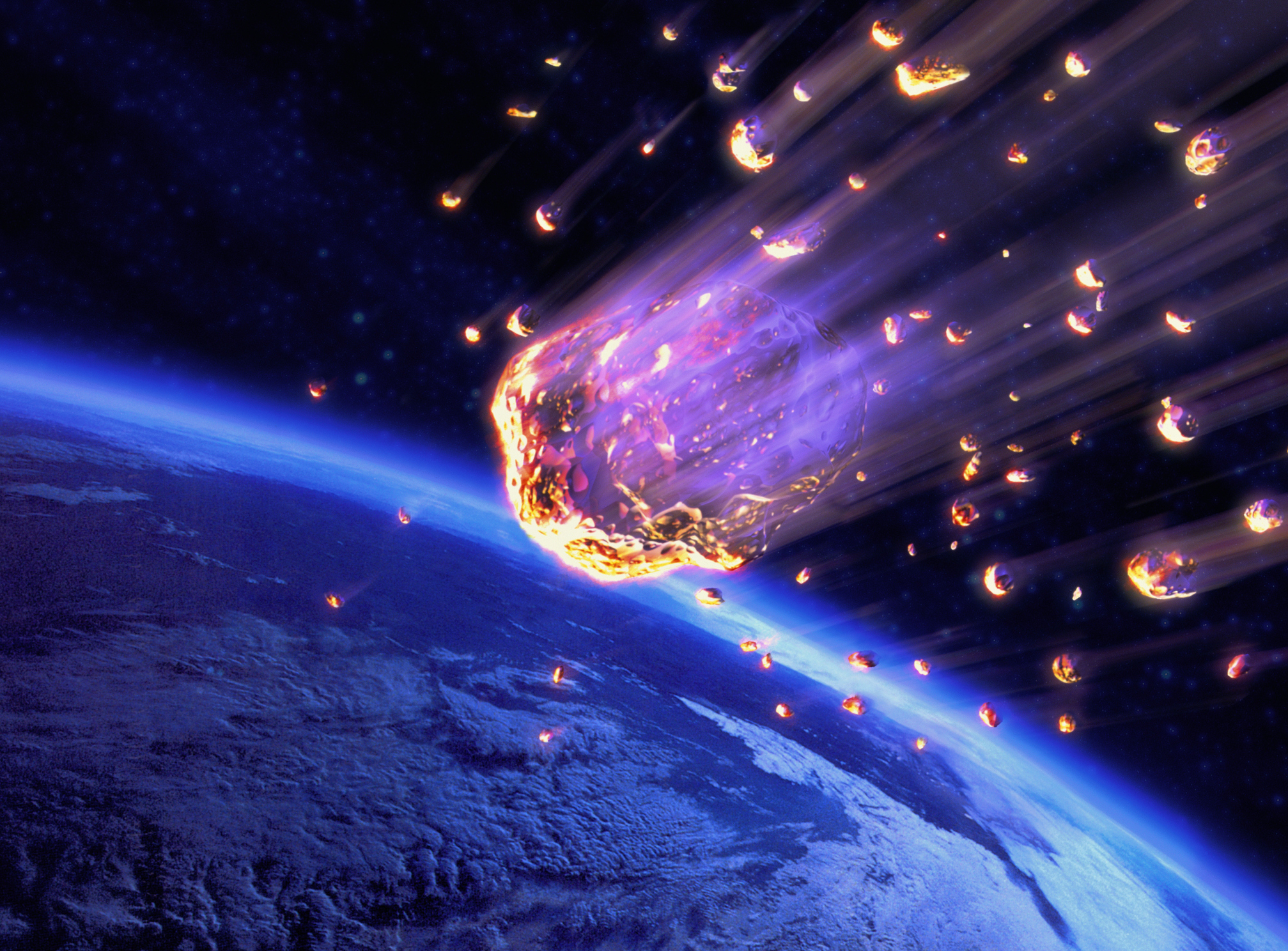 Illustration of an asteroid breaking apart as it hits Earth's atmosphere.