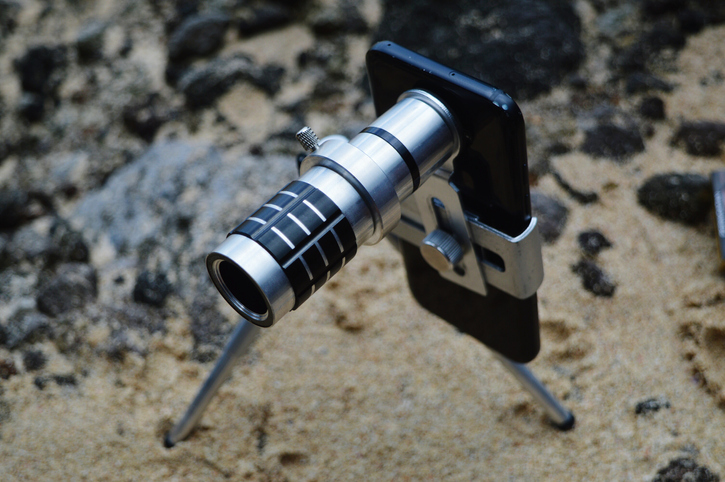 A smartphone zoom lens is a good option for photographing the Moon. Credit: Agus Fatwadi / EyeEm / Getty