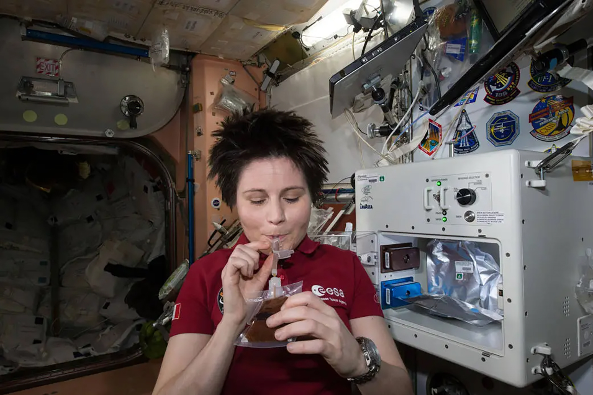 Astronaut Samantha Cristoforetti enjoys her first coffee from the ISSpresso machine on the Space Station. Credit: NASA