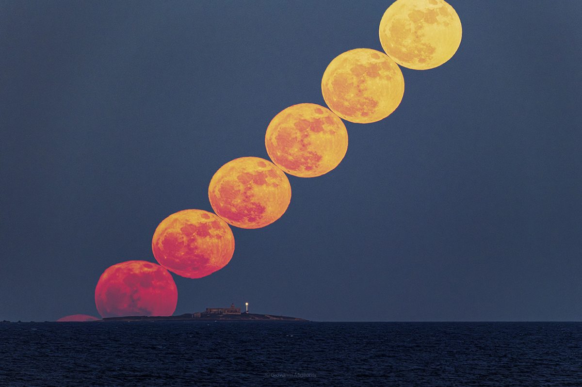 A beautiful view of the full Moon rising behind the Isola delle Correnti (Island of Currents), captured by Giovanni Migliorisi from Punta Castellazzo in the municipality of Ispica, Sicily, Italy, 31 May 2026, 20:41–20:46 local time. Equipment: Nikon D850 camera, Tamron 150-600mm lens at 600mm Exposure: ISO 6400, f/8, 1/30s Software: Lightroom and Photoshop