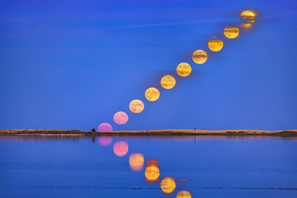 Hunter's Moon of 9 October 2022 rising over Crawling Lake Reservoir, Alberta, Canada. Credit: Alan Dyer/Stocktrek Images/Getty Images